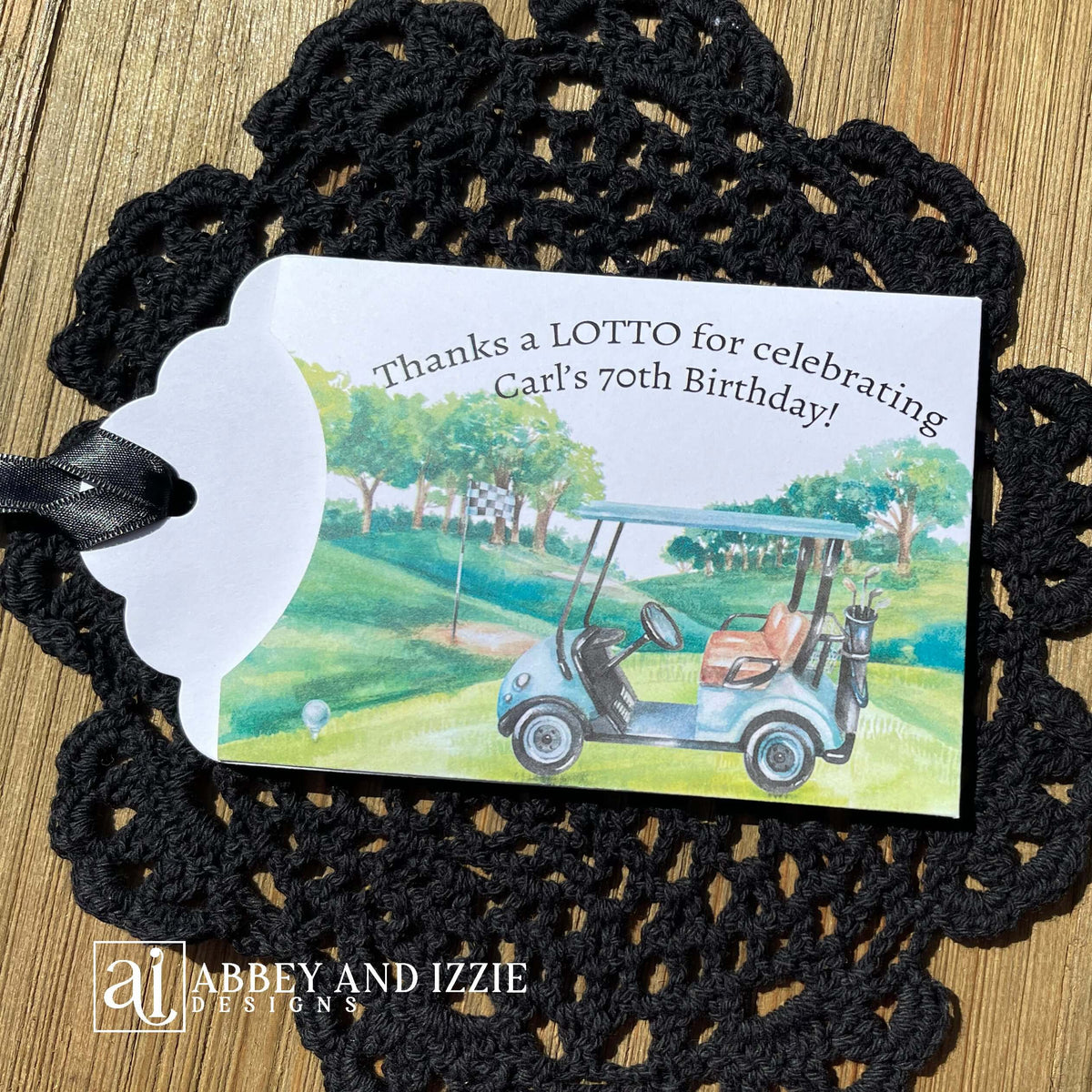 Golf theme birthday party favors, slide a lotto ticket in these cute envelopes for a fun favor.  Printed on white card stock with a black ribbon attached, these are adorned with a golf scene and are personalized for the guest of honor.