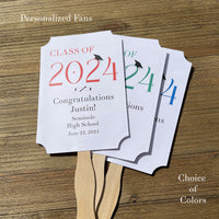 Personalized graduation favor fans to keep guest cool and a fun keepsake to take home. Each printed on white card stock, ship fully assembled, two sided with handle hidden between.