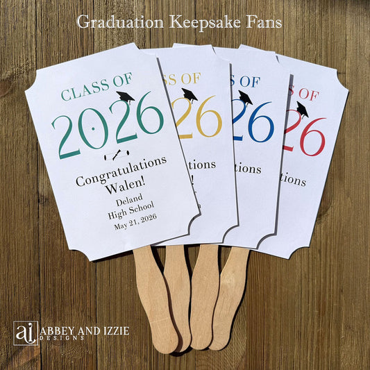  Personalized Graduation Fansto keep guest cool and a fun keepsake to take home. Each printed on white card stock, ship fully assembled, two sided with handle hidden between.  Your choice of year color.
