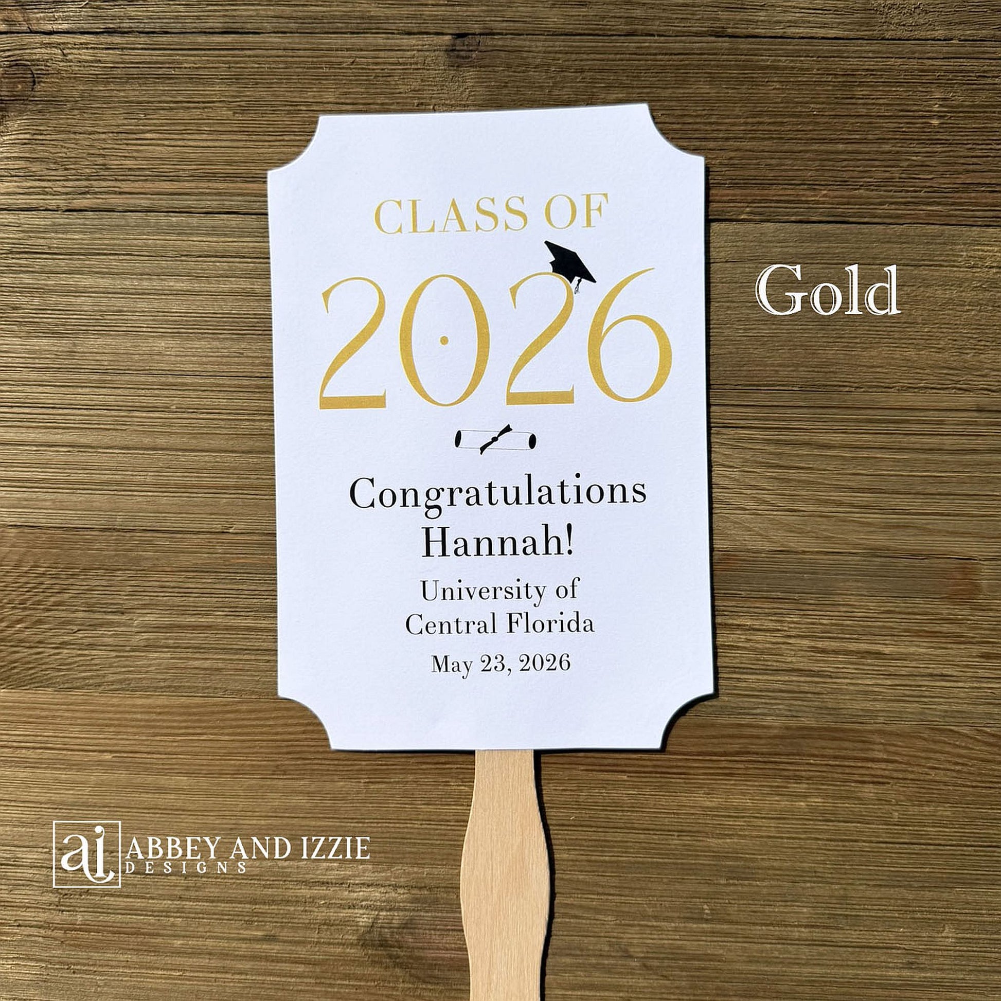  Personalized Graduation Fansto keep guest cool and a fun keepsake to take home. Each printed on white card stock, ship fully assembled, two sided with handle hidden between.  Your choice of year color.
