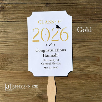  Personalized Graduation Fansto keep guest cool and a fun keepsake to take home. Each printed on white card stock, ship fully assembled, two sided with handle hidden between.  Your choice of year color.