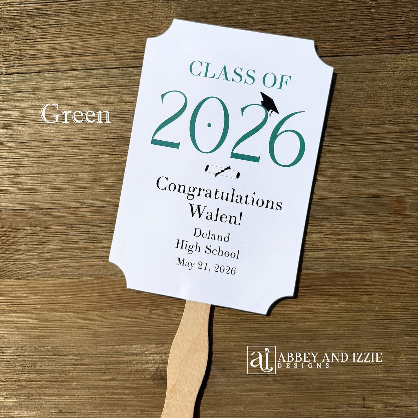  Personalized Graduation Fansto keep guest cool and a fun keepsake to take home. Each printed on white card stock, ship fully assembled, two sided with handle hidden between.  Your choice of year color.