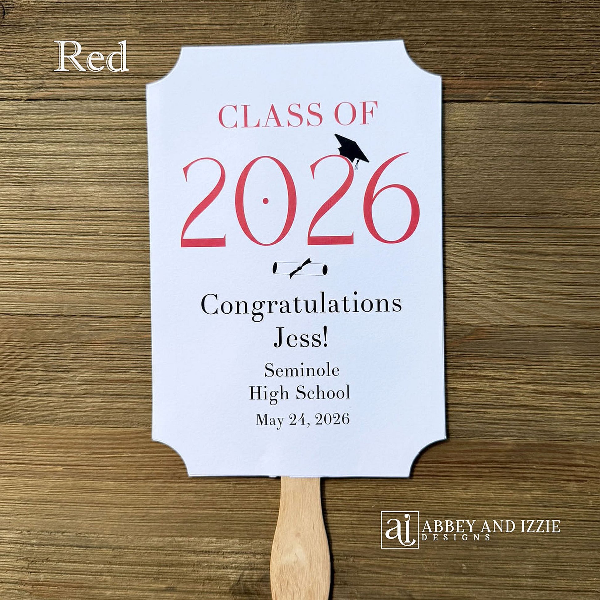  Personalized Graduation Fansto keep guest cool and a fun keepsake to take home. Each printed on white card stock, ship fully assembled, two sided with handle hidden between.  Your choice of year color.