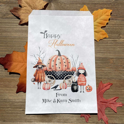  White paper bags, Personalized Halloween Candy Bags, adorned with cute witches these can be used for trick or treat bags or trunk or treat bags.  Also can personalized for a business promotion to hand out at Halloween