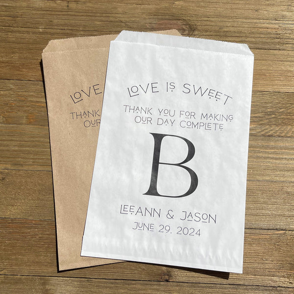 Monogrammed wedding bags, printed with love is sweet thank you for making our day complete with your large initial in the center.  Personalized wedding favor bags are larger than most, perfect for a candy buffet, cookie buffet, popcorn or whatever you desire. 