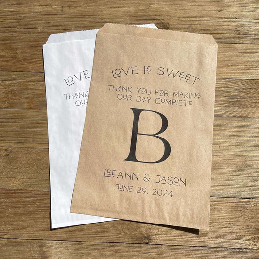 Monogrammed Wedding bags, printed with love is sweet thank you for making our day complete with your large initial in the center.  Personalized wedding favor bags are larger than most, perfect for a candy buffet, cookie buffet, popcorn or whatever you desire. 