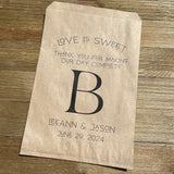 Monogrammed wedding bags, printed with love is sweet thank you for making our day complete with your large initial in the center.  Personalized wedding favor bags are larger than most, perfect for a candy buffet, cookie buffet, popcorn or whatever you desire. 