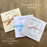 Personalized envelopes, lotto ticket holders for birthday favors.  Adorned with the honoree's name and birthday number, ribbon tied aound for a elegant touch.  Your choice of envelope and ribbon color.