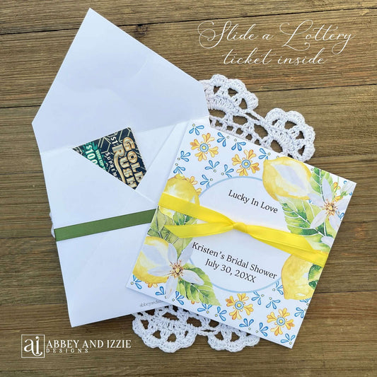 Add some fun to your bridal shower with our Personalized Lemon Bridal Shower Favors .  Slide a scratch off ticket in and see who wins.  Printed on white cardstock and adorned with blue tiles and lemons these will be a elegant addition to your Italian themed wedding shower.  Personalzied for the bride to be with your choice of ribbon color.