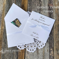 Personalized engagement party favors, slide a lotto ticket in these envelopes to see who wins.  Printed with, thanks a lotto for celebrating our engagement!  with love the happy couple.  White envelopes, your choice of ribbon color which comes attached