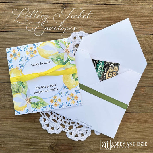 Mediterranean wedding guest favors, personalzied for the bride and groom. Lottery ticket envelopes adorned with blue tiles and lemons to match your Italian theme. Slide a lotto ticket in or enclose gift cards, custom coasters, seeds or photos.