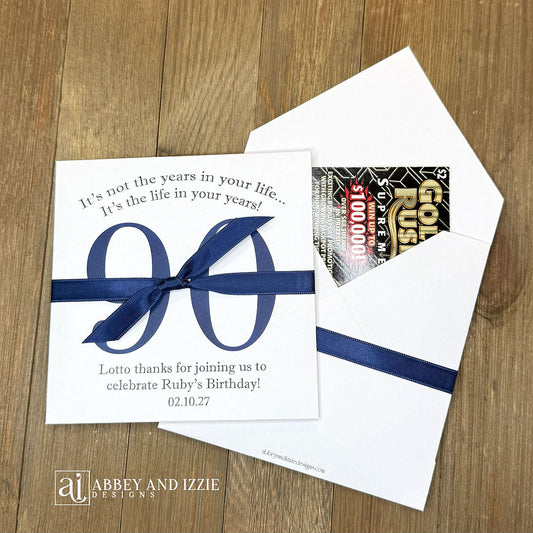 Reveal the fun with scratch-off birthday party favors that double as entertainment and keepsakes; Slide open the back side and enclose scratch off ticket for each guest, a fun and interactive party favor. Ideal for milestone birthdays, personalize with names, date and sweet message Each envelope is printed on sturdy white cardstock with your choice of number and ribbon color to match you party theme. Shipped to you assembled with ribbon. Scratch off tickets are NOT included.