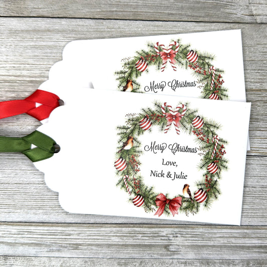 Personalized Christmas Party Favors Affordable Christmas Gifts, adorned with a beautiful wreath and a red  or green ribbon attached.  These can be used for lottery ticket favors or gift card holders.