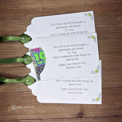 Unique St. Patrick's Day Favors Lottery Ticket Holders are perfect to see who has the 'luck of the Irish! Just slide a scratch off lotto ticket in these adorable St Patrick's Day favors personalized just for you!  White envelope with green ribbon attached.