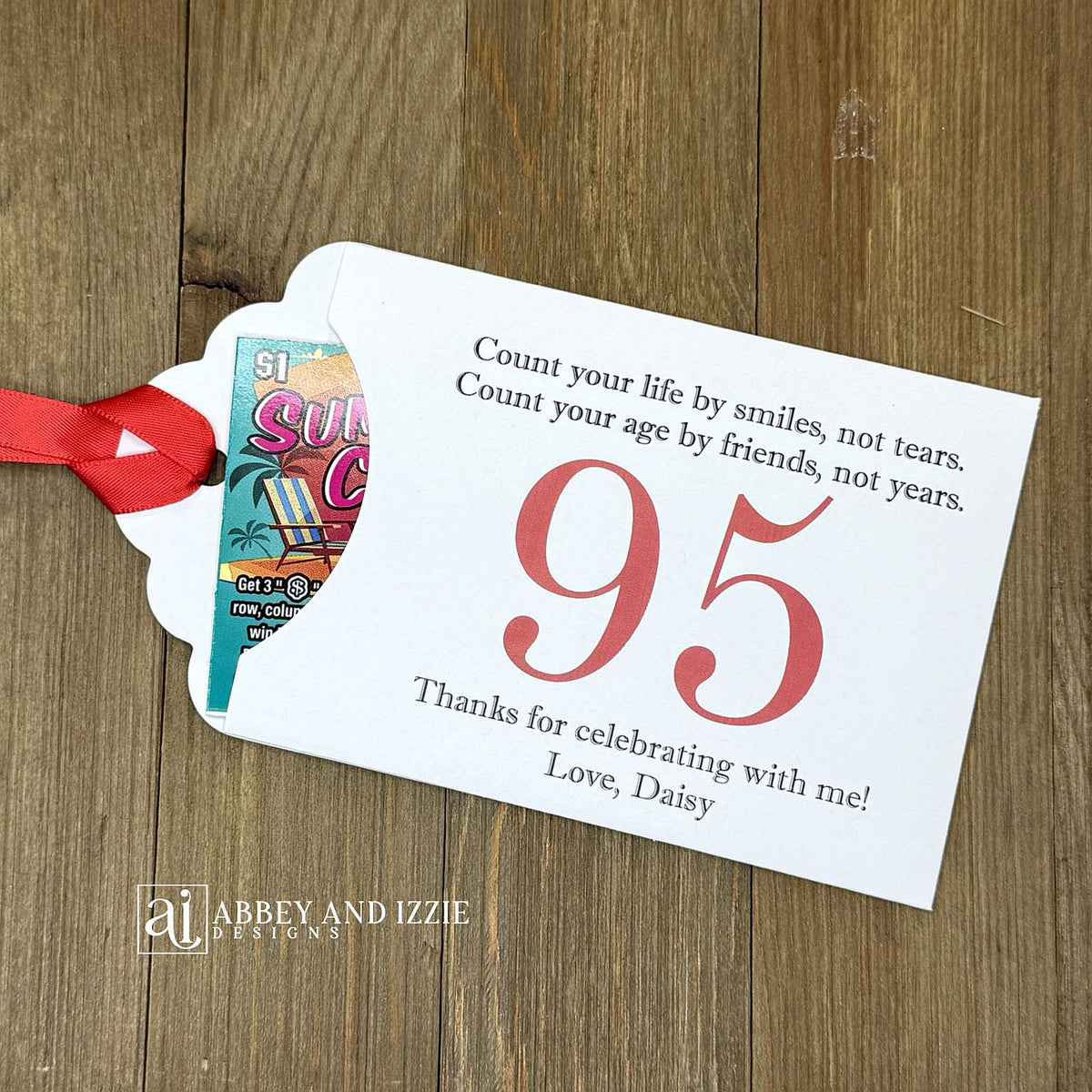 Celebrate with milestone birthday party guest favors that they will treasure. Each favor is customized with names, dates and a special messages to make your event unforgettable. Perfect for 30th, 40th, 50th, and beyond—these keepsakes add a personal touch to any milestone celebration.&nbsp; &nbsp;Printed on white cardstock with your choice of large number and ribbon color to match your party theme.&nbsp;