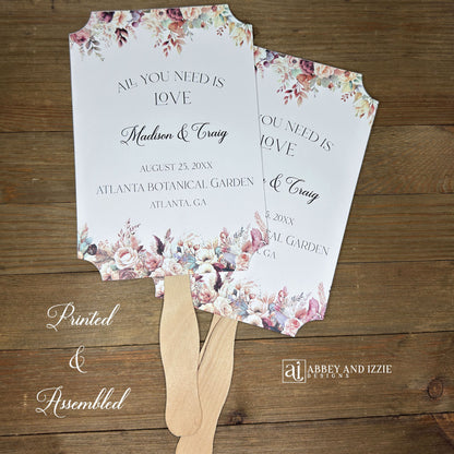 Mocha wedding fans, printed on white card stock with mocha flowers flowing from the top and bottom.  Personalized fans, wooden handle hidden between the two layers of cardstock, shipped assembled.