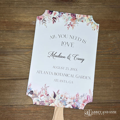 Mocha wedding fans, printed on white card stock with mocha flowers flowing from the top and bottom.  Personalized fans, wooden handle hidden between the two layers of cardstock, shipped assembled.