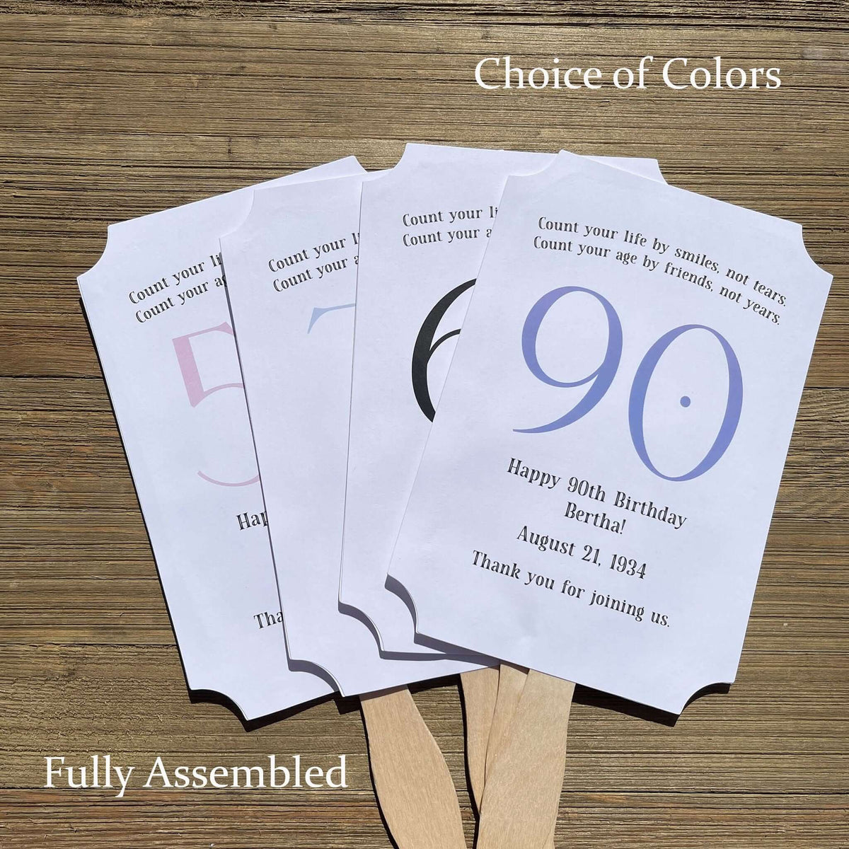 Milestone Birthday Party Favor Fans, keep your guests cool with our fans, perfect keepsake to take home from the party.  Adorned with the large birthday number with the name and birth date of the guest of honor.  Printed on white card stock with your choice of color number.