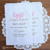 Babies are sweet enjoy a treat thank you for making my day complete. Adorned with a pink bow and personalized for the mother to be these bags are perfect for a candy bar or any sweet treat for your guests.