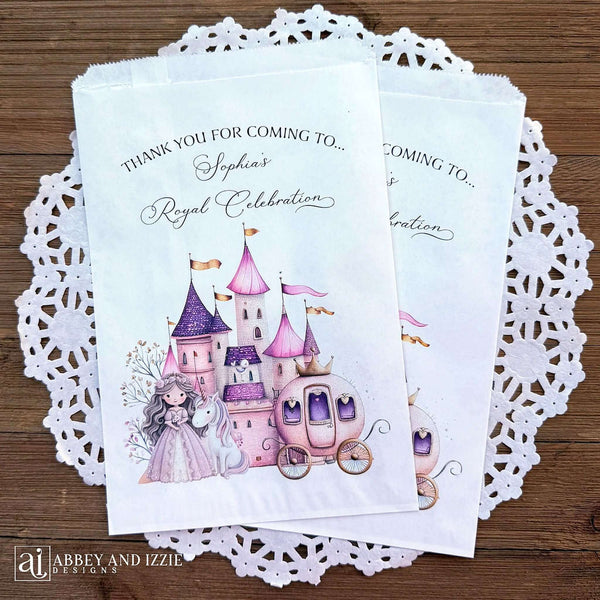 Make your event unforgettable with these Princess Party Favor Bags, personalized to add a special touch.  Printed on white bags with touches of pink and purple, a castle in the background with a princess and unicorn and her carriage.  Printed with thank you for coming to (Your name) royal celebration.  Perfect for candy, cookies or fun gifts.  