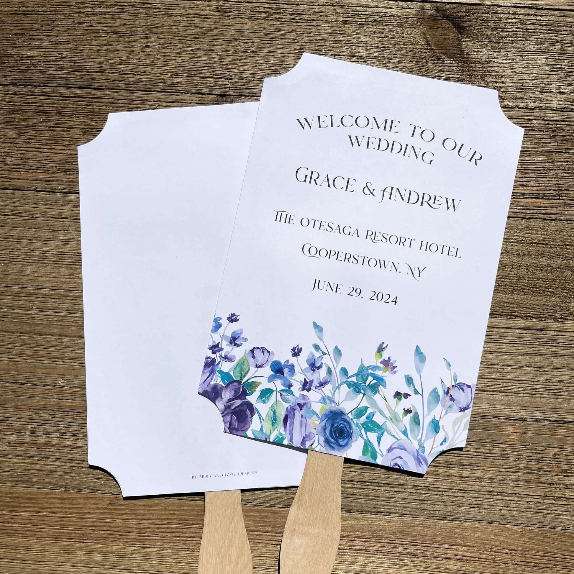 Lavender Wedding Fans Personalized, adorned with lavender flowers printed on white card stock.  Personalized for the bride and groom including the place and wedding date.  Fans come fully assembled, two sided with handle hidden between.  A great keepsake while keeping guests cool and comfortable.