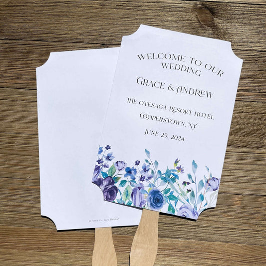 Lavender Wedding Fans Personalized, adorned with lavender flowers printed on white card stock.  Personalized for the bride and groom including the place and wedding date.  Fans come fully assembled, two sided with handle hidden between.  A great keepsake while keeping guests cool and comfortable.