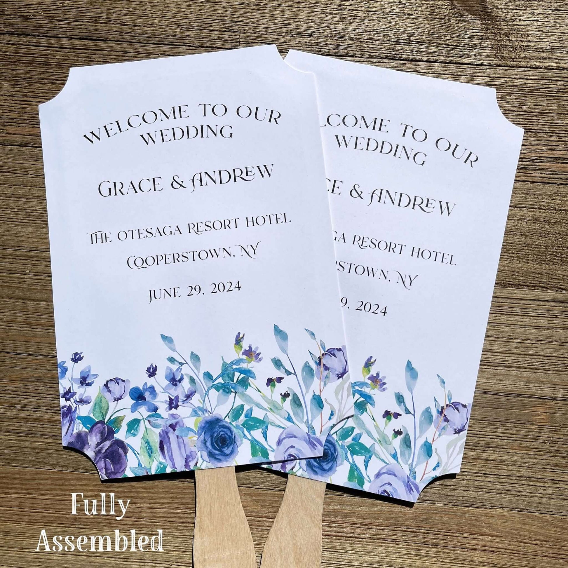 Lavender Wedding Fans Personalized, adorned with lavender flowers printed on white card stock.  Personalized for the bride and groom including the place and wedding date.  Fans come fully assembled, two sided with handle hidden between.  A great keepsake while keeping guests cool and comfortable.