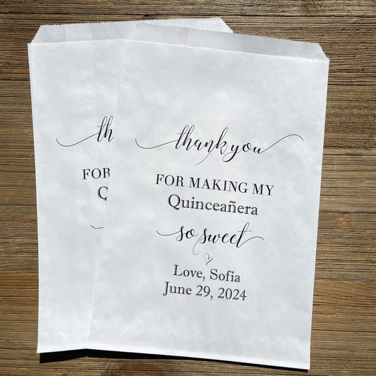 Personalized Quinceanera Candy Favor Bags printed on white bags, 'thank you for making my Quinceanera so sweet'.  Bags are larger than most and perfect for a candy buffet or any sweet treat you would like.