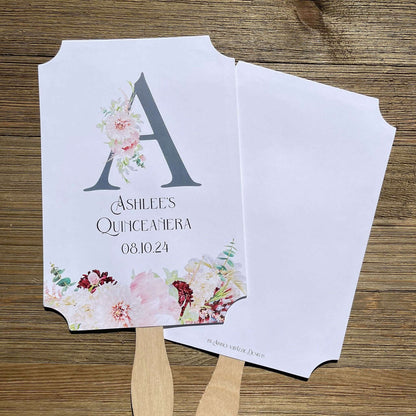 Personalized Quinceanera Monogrammed Fans.  Fans are printed on white card stock and come fully assembled, adorned with a large initial and pink and burgundy flowers for an elegant touch.