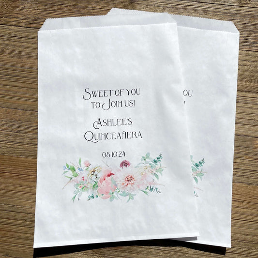 Quinceanera Sweet of you to join us bags, printed on white bags, personalized for the guest of honor.  Sweet of you to join us printed makes these bags perfect for a candy buffet.  Adorned with pink flowers at the bottom for an elegant touch.