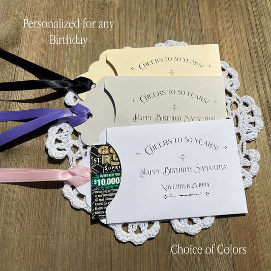30th Birthday Lotto Ticket Party Favors, shown here for a 30th birthday they can be made for any birthday.  Cute envelopes, slide a lotto ticket in to see who wins big.  Your choice of envelope and ribbon color, ribbon included and comes attached.
