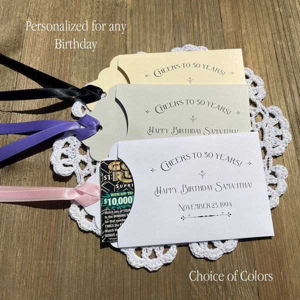 Cheers to 30 years birthday party favors personalized.  Shown here for a 30th birthday they can be made for any birthday.  Cute envelopes, slide a lotto ticket in to see who wins big.  Your choice of envelope and ribbon color, ribbon included and comes attached.