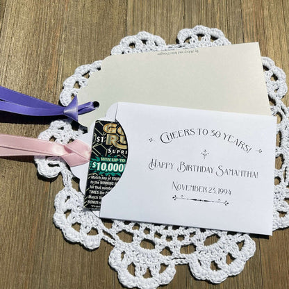 30th Birthday Lotto Ticket Party Favors, shown here for a 30th birthday they can be made for any birthday.  Cute envelopes, slide a lotto ticket in to see who wins big.  Your choice of envelope and ribbon color, ribbon included and comes attached.