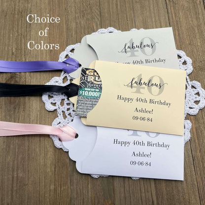 Bring some fun to the party with these 40th Birthday Party Favors , slide a lotto ticket in the envelope and see who wins big.  Each envelope is personalized for the guest of honor and comes in your choice of envelope color and ribbon color.