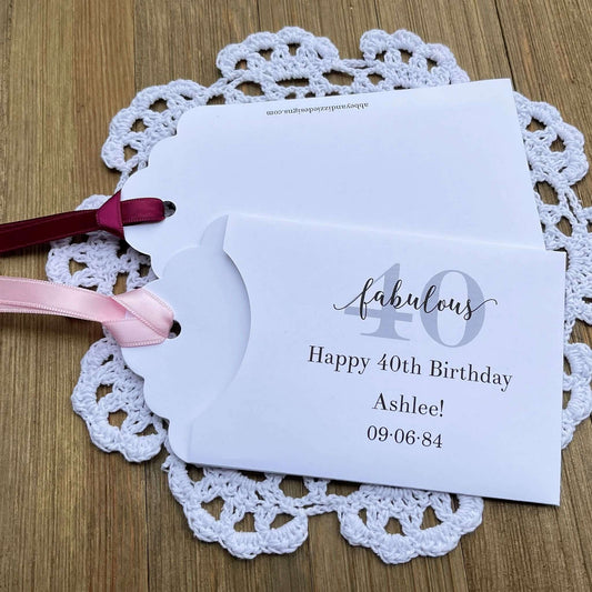 Bring some fun to the party with these 40th birthday party favors, slide a lotto ticket in the envelope and see who wins big.  Each envelope is personalized for the guest of honor and comes in your choice of envelope color and ribbon color.