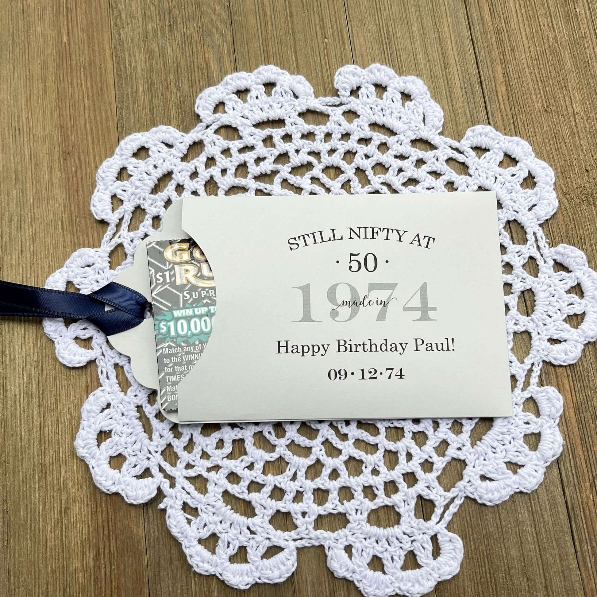 Unique 50th Birthday Party Favors, personalized for the guest of honor.  These favors will add some fun to the event, slide a instant lotto ticket in to see who wins.  Your choice of envelope and ribbon color.
