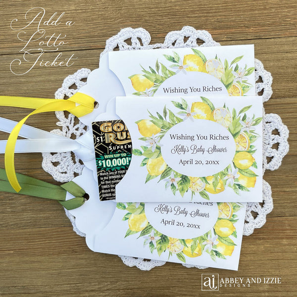 Amalfi Coast baby shower favors, adorned with a lemon frame.  Baby shower lotter ticket favors, slide a lotto ticket in for a fun favor.  Personalized with 'Wishing you Riches' and the Mom to be Baby shower and date.