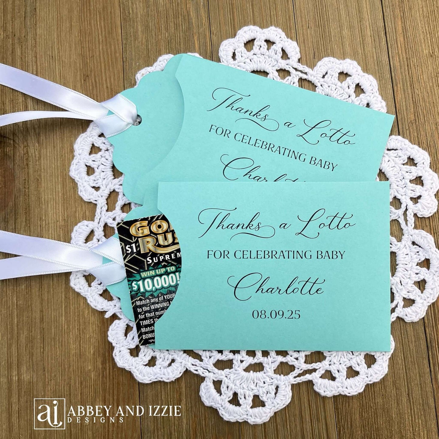 Add some fun with these lottery ticket baby shower favors. Printed on white or turquoise card stock with your choice of ribbon. Personalized for the baby, printed with 'thanks a lotto for celebrating baby'