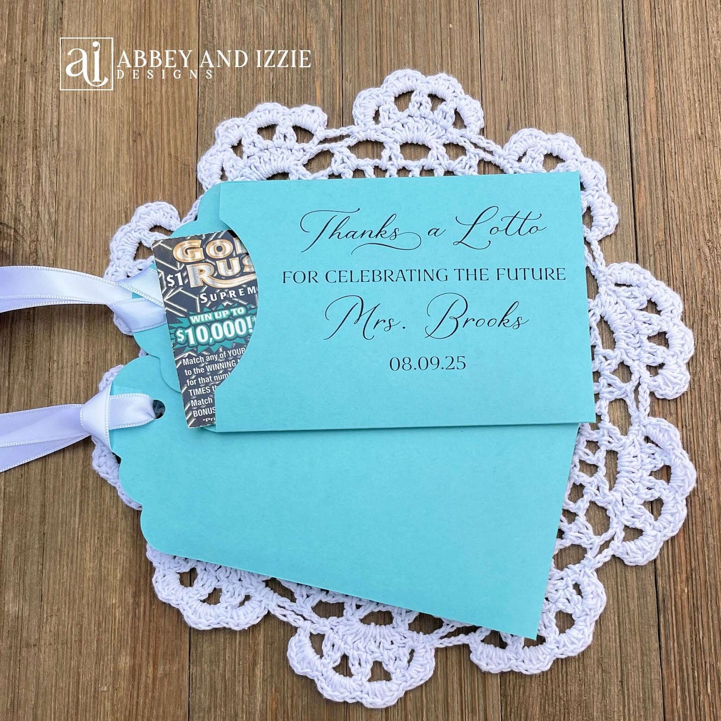 Bridal Shower Instant Lotto Favors, unique and fun favors for your guests.  Slide a lottery ticket in to see who wins.  Printed on white or turquoise card stock, thanks a lotto for celebrating the future Mrs. personalized for the bride to be.  
