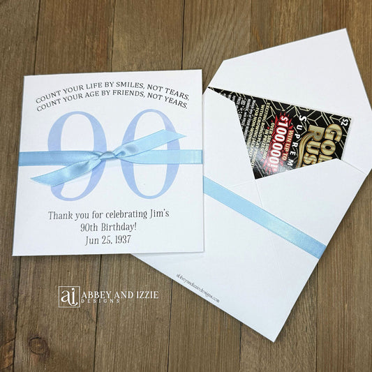 Scratch Off Birthday Party Favors add an interactive element to your celebration. Guests will find a scratch off ticket tucked inside—perfect for keeping everyone entertained. Ideal for birthday parties of any size, these customizable favors work as icebreakers or thank-you gifts. Printed on durable white cardstock ensures they hold up through the party. Personalize with names, date, and a sweet message.&nbsp; Choice of birthday number color and ribbon color to match your party theme.
