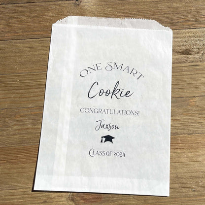 Personalized Graduation Cookie Bags, One smart cookie graduation cookie favor bags.  Personalized for the graduate, fill with cookies or use for a cookie bar or cookie buffet.  Glassine bags are printed for an elegant touch.