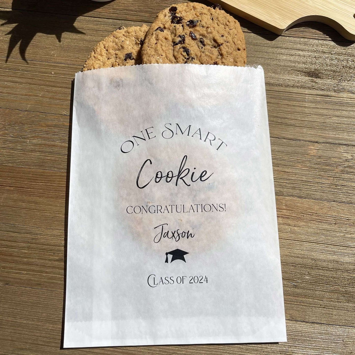 Personalized Graduation Cookie Bags, One smart cookie graduation cookie favor bags.  Personalized for the graduate, fill with cookies or use for a cookie bar or cookie buffet.  Glassine bags are printed for an elegant touch.