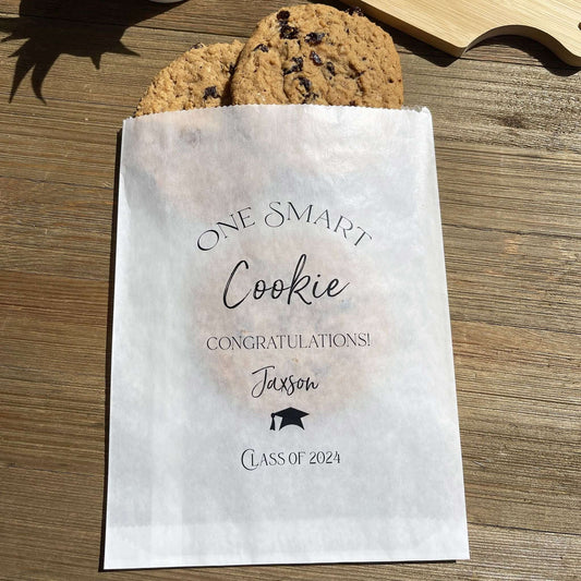 Personalized Graduation Cookie Bags, One smart cookie graduation cookie favor bags.  Personalized for the graduate, fill with cookies or use for a cookie bar or cookie buffet.  Glassine bags are printed for an elegant touch.