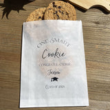 One smart cookie graduation cookie favor bags.  Personalized for the graduate, fill with cookies or use for a cookie bar or cookie buffet.  Glassine bags are printed for an elegant touch.