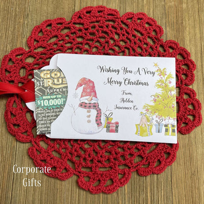 Small Christmas gift Lottery Ticket Envelopes featuring a snowman design and red ribbon, perfect for holiday gifting.