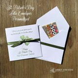 Personalized St. Patrick's Day Favors featuring a green ribbon and four leaf clover design on envelope.