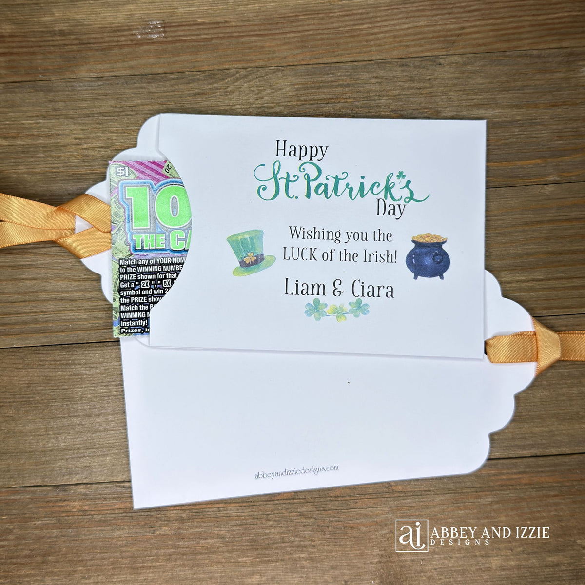 Personalized St Patrick's Day Party Favors, 'Happy St. Patrick's Day, wishing you the LUCK of the Irish'.  Printed on white card stock, adorned with a green hat, pot of gold and gold ribbon attached.  Slide a lottery ticket in the open end and see who has the LUCK of the Irish.