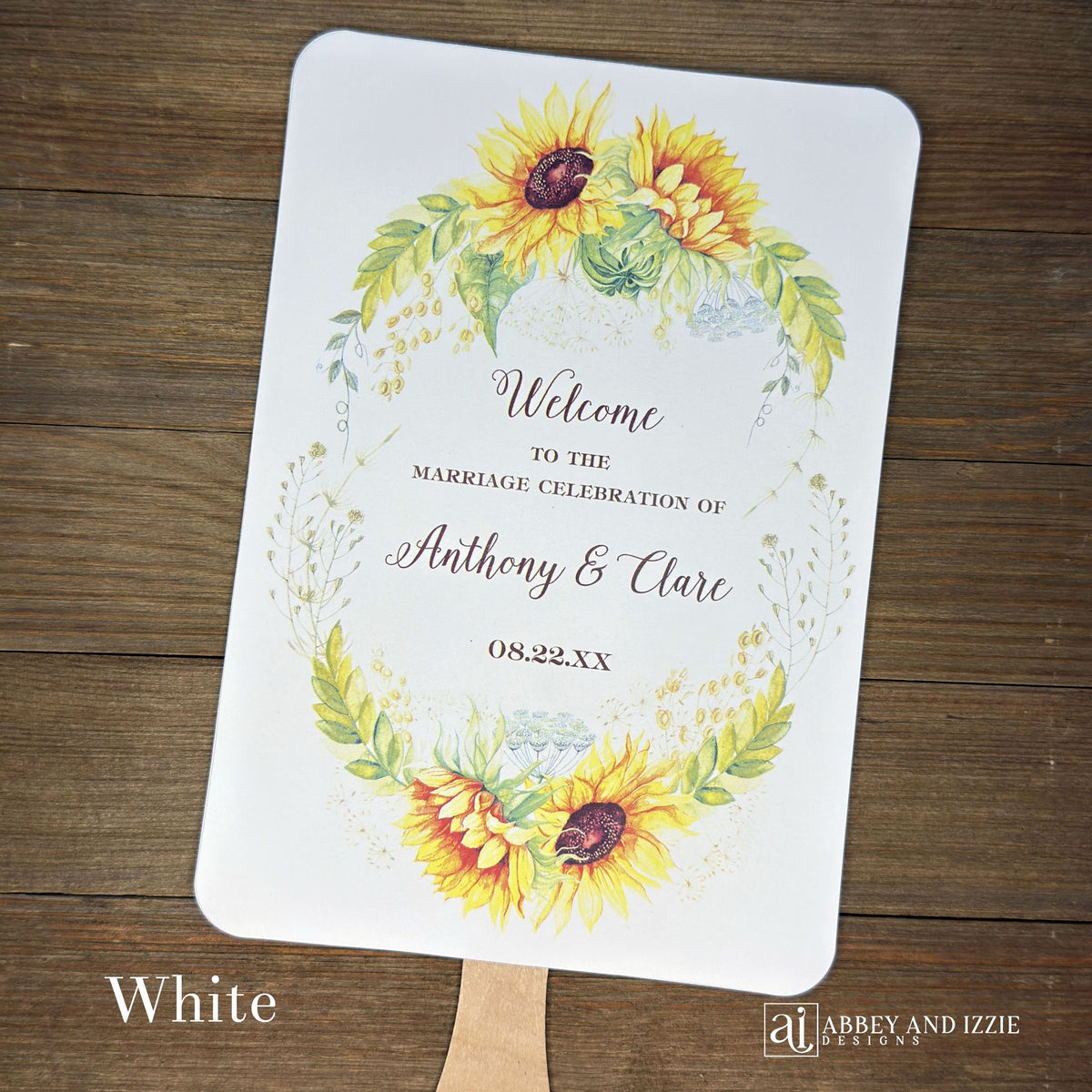 Sunflower Wedding Hand Fans Personalized , personalized for the bride and groom and adorned with a ring of sunflowers.  Fans are printed on ivory or white cardstock, two sided so handle is hidden between.  Wedding fans ship fully assembled and ready for your big day.