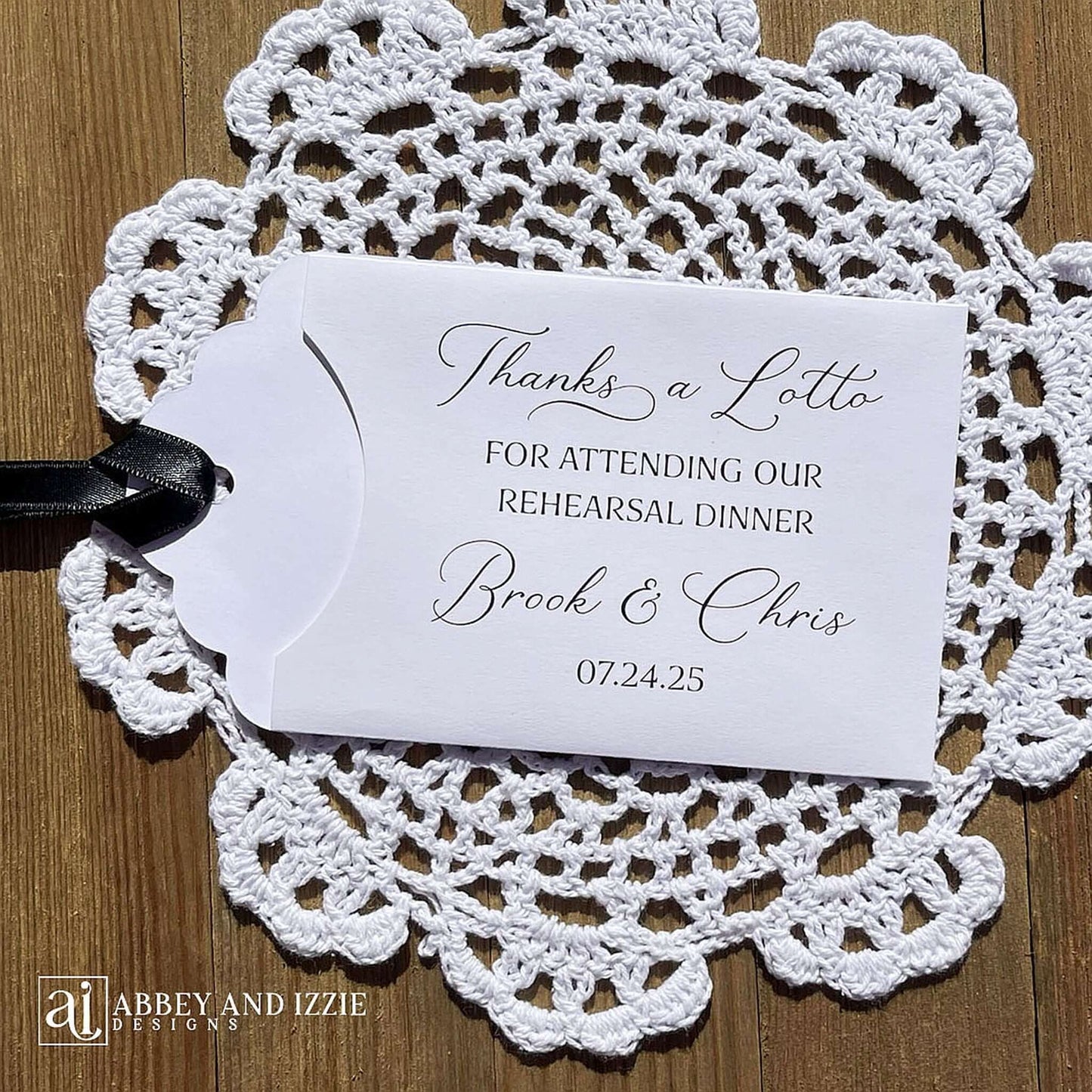 Our Scratch off Lotto Rehearsal Dinner Favors are sure to be a hit.  White envelopes printed with 'Thanks a lotto for attending our rehearsal dinner' with bride and grooms names and date.  Slide a lottery ticket in these white envelopes to see who wins.  Ribbon comes attached, your choice of color.