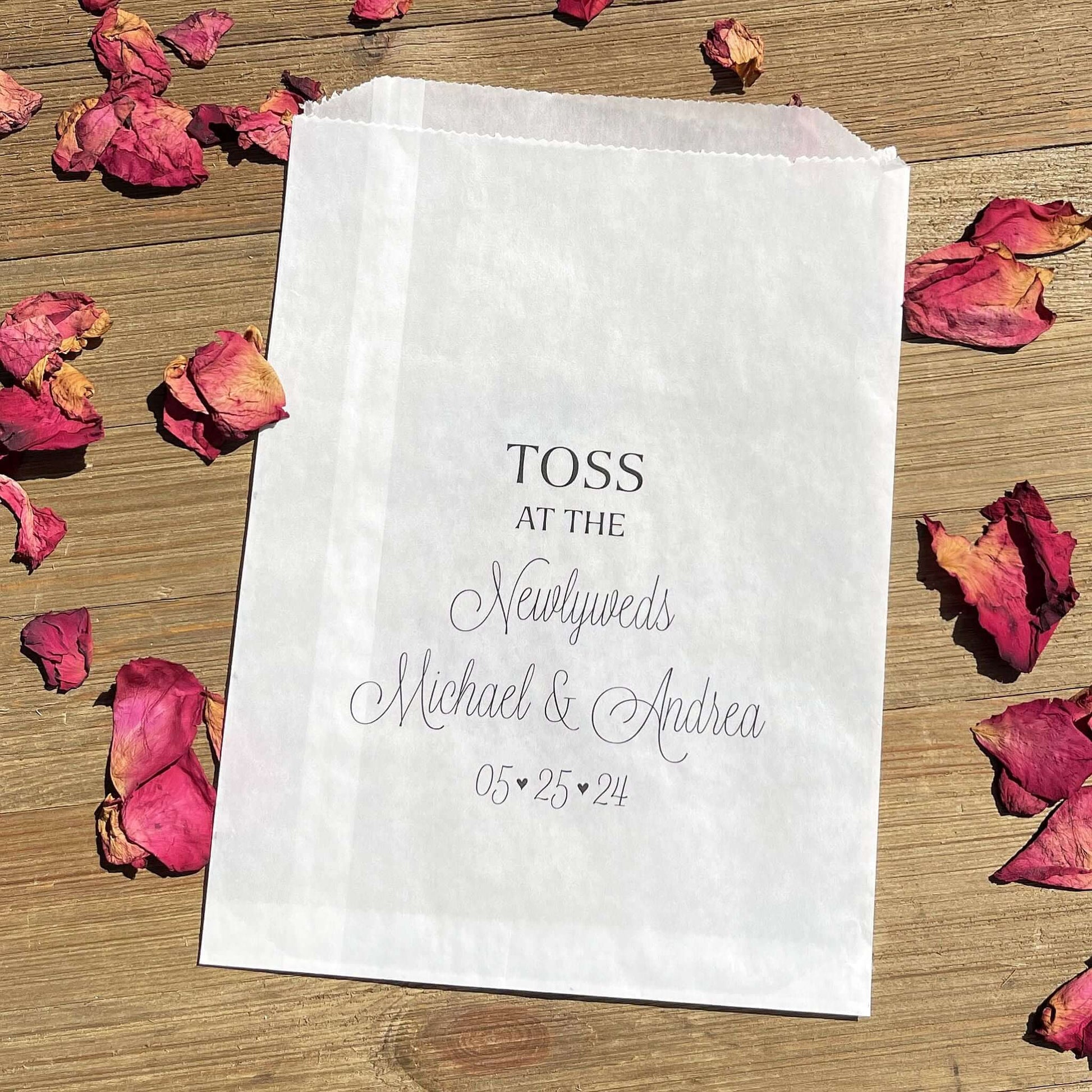 Wedding Petal Toss Bags Personalized  for the bride and groom.  Printed on glassine bags for an elegant touch.  Fill with rose petals, confetti,  flower petals, lavender or rice. Toss at the newlyweds when they exit.